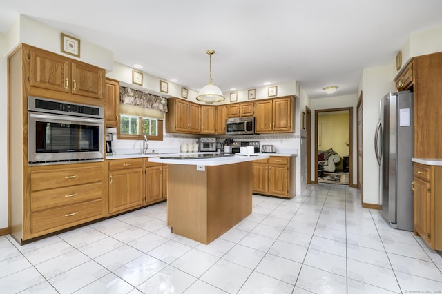 491 Hammertown Rd, Monroe, CT 06468 - kitchen featuring appliances with stainless steel finishes, light countertops, a center island, tasteful backsplash, and brown cabinets