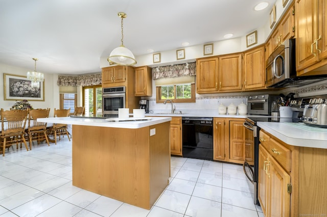 491 Hammertown Rd, Monroe, CT 06468 - kitchen featuring stainless steel appliances, light countertops, a chandelier, a kitchen island, and recessed lighting