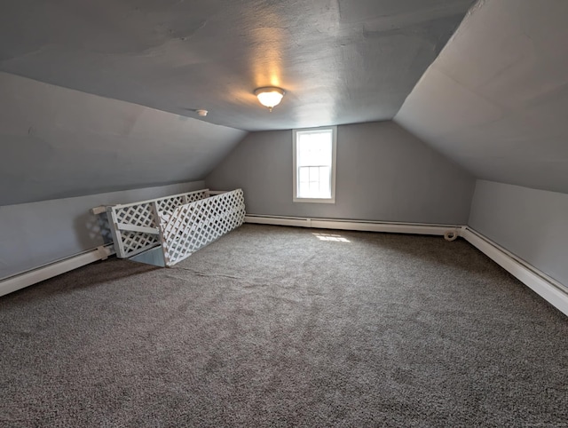 18 Highland St, Plainfield, CT 06354 - bonus room with lofted ceiling, carpet floors, and a baseboard heating unit