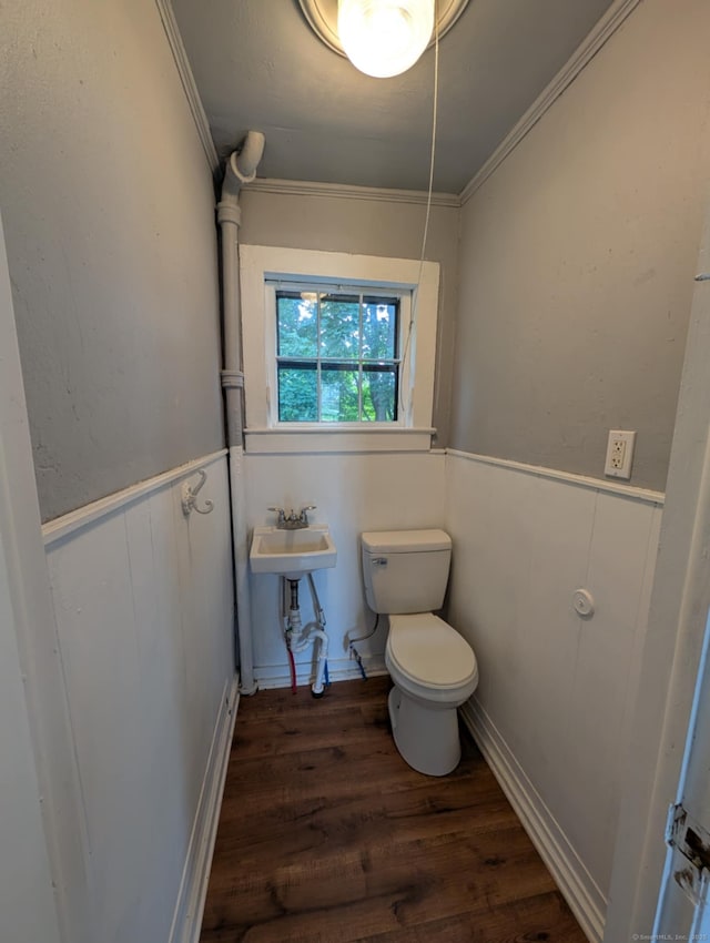 18 Highland St, Plainfield, CT 06354 - bathroom with a wainscoted wall, wood finished floors, and ornamental molding