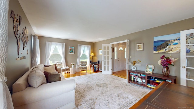 803 Grassy Hill Rd, Orange, CT 06477 - living area featuring wood finished floors and french doors