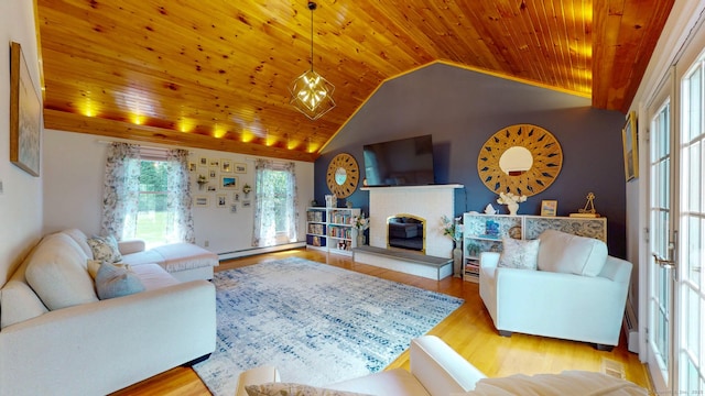 803 Grassy Hill Rd, Orange, CT 06477 - living area with wood ceiling, vaulted ceiling, a fireplace, wood finished floors, and a baseboard heating unit