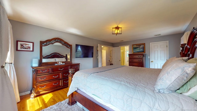 803 Grassy Hill Rd, Orange, CT 06477 - bedroom featuring wood finished floors and baseboards