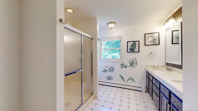 803 Grassy Hill Rd, Orange, CT 06477 - full bath with a baseboard heating unit, tile patterned floors, a shower with shower door, and double vanity