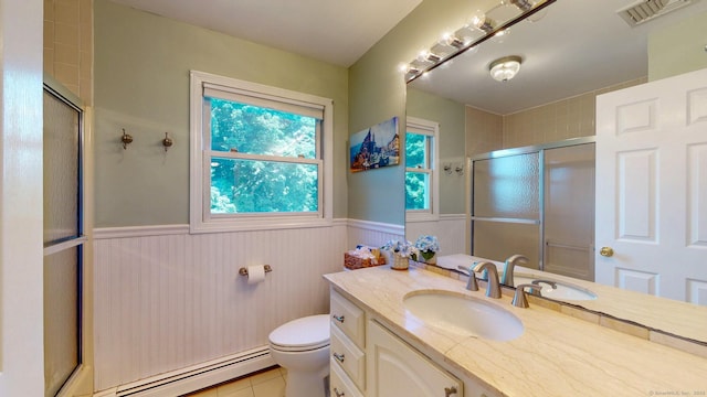 803 Grassy Hill Rd, Orange, CT 06477 - bathroom featuring baseboard heating, wainscoting, vanity, a shower with shower door, and tile patterned floors