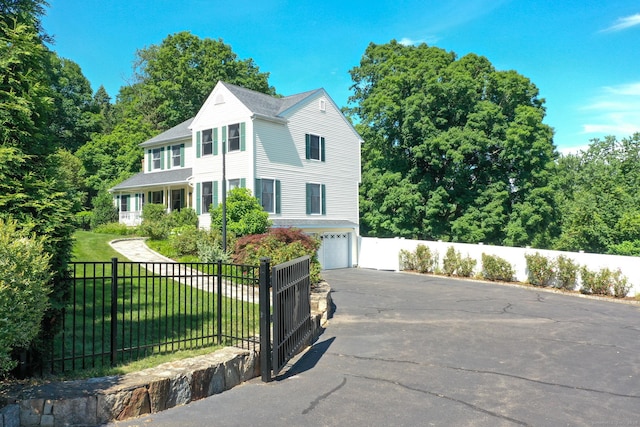 803 Grassy Hill Rd, Orange, CT 06477 - view of front of property with driveway and an attached garage