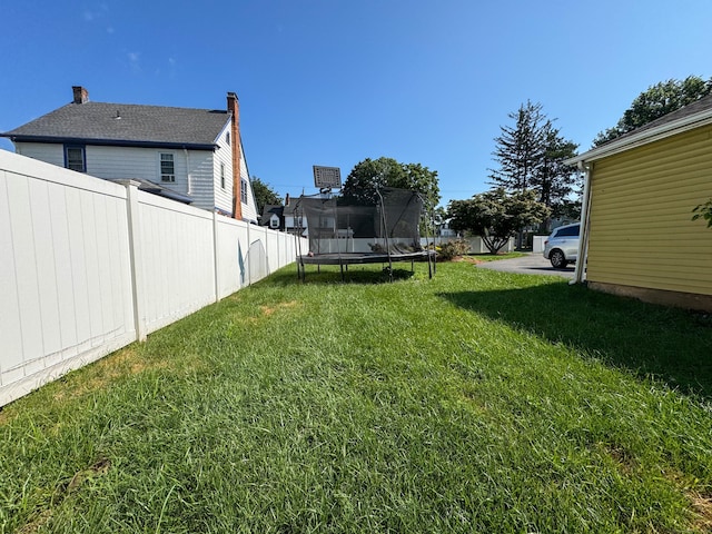 1589 Main St, East Hartford, CT 06108 - view of yard featuring a trampoline