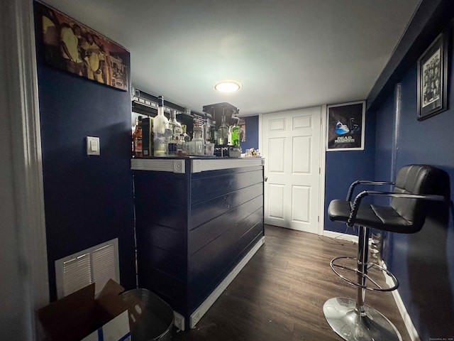 1589 Main St, East Hartford, CT 06108 - bar area featuring dark wood finished floors and baseboards