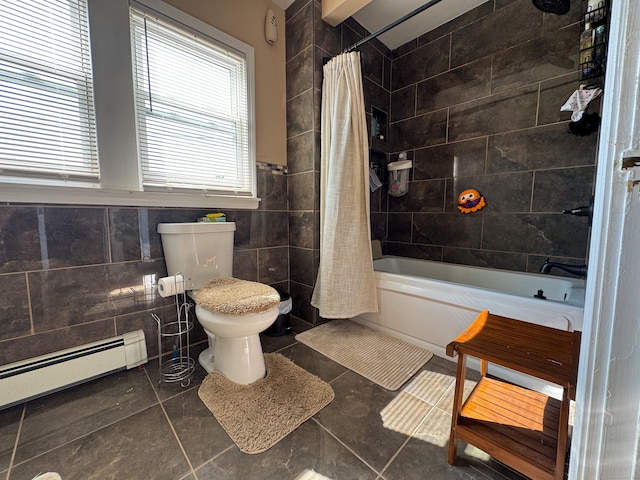 1589 Main St, East Hartford, CT 06108 - bathroom featuring a baseboard heating unit, tile patterned flooring, shower / bath combo, and tile walls