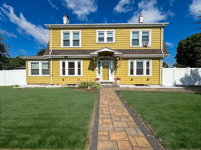 1589 Main St, East Hartford, CT 06108 - view of front of property with a chimney and cooling unit