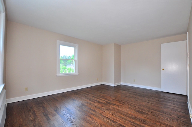 47 Westwood Dr, Simsbury, CT 06070 - empty room featuring dark wood-style flooring and baseboards