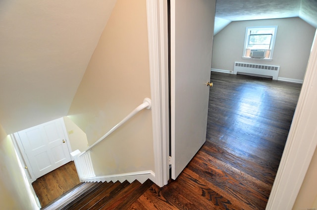 47 Westwood Dr, Simsbury, CT 06070 - staircase with radiator, wood finished floors, vaulted ceiling, and cooling unit