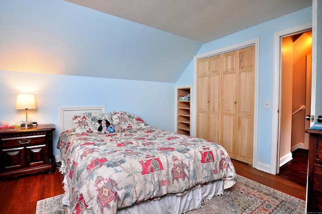 47 Westwood Dr, Simsbury, CT 06070 - bedroom featuring a closet, dark wood finished floors, and lofted ceiling