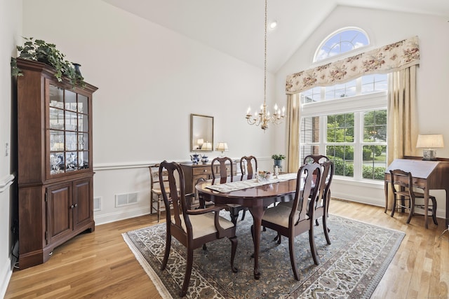 39 Emily Way Unit 39, West Hartford, CT 06107 - dining room with healthy amount of natural light, light wood-type flooring, a chandelier, high vaulted ceiling, and recessed lighting