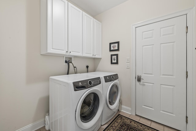 39 Emily Way Unit 39, West Hartford, CT 06107 - washroom with cabinet space, washing machine and clothes dryer, and light tile patterned floors