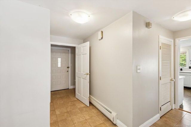 80 Tuckie Rd, Windham, CT 06280 - corridor featuring baseboard heating and light tile patterned flooring