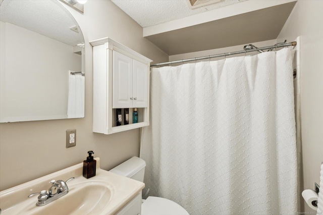 80 Tuckie Rd, Windham, CT 06280 - bathroom with vanity, a textured ceiling, and a shower with curtain