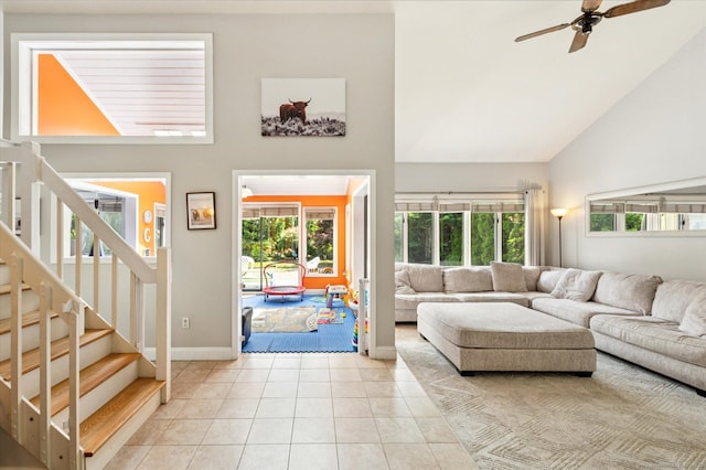 80 Tuckie Rd, Windham, CT 06280 - living room with high vaulted ceiling, ceiling fan, stairs, and light tile patterned floors