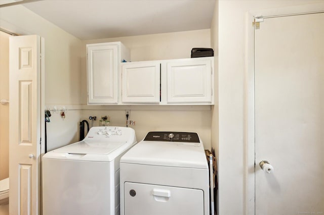 80 Tuckie Rd, Windham, CT 06280 - laundry area featuring separate washer and dryer and cabinet space
