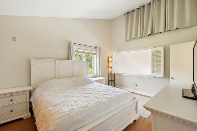 80 Tuckie Rd, Windham, CT 06280 - bedroom featuring wood finished floors and vaulted ceiling