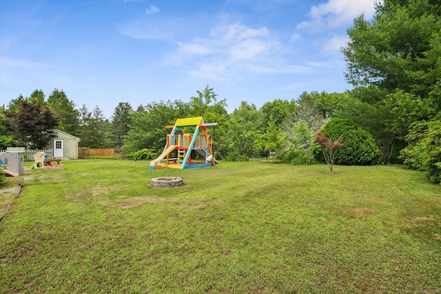 80 Tuckie Rd, Windham, CT 06280 - view of yard with a fire pit, a playground, and a storage shed