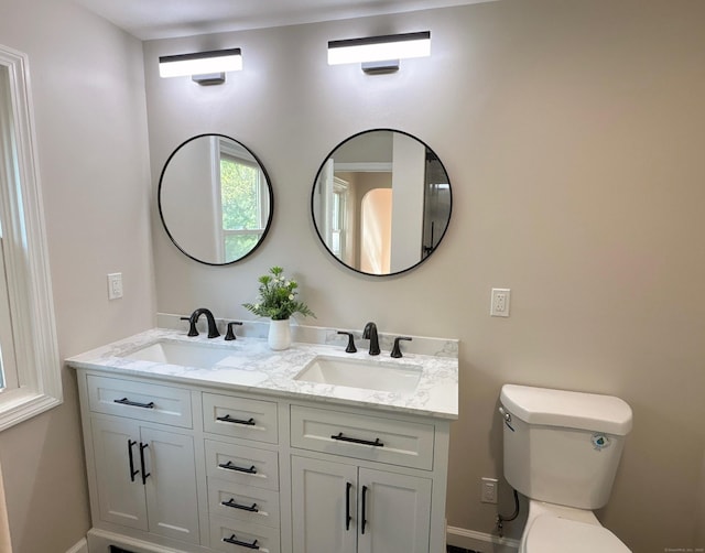 2125 Shepard Ave, Hamden, CT 06518 - full bathroom featuring double vanity and toilet