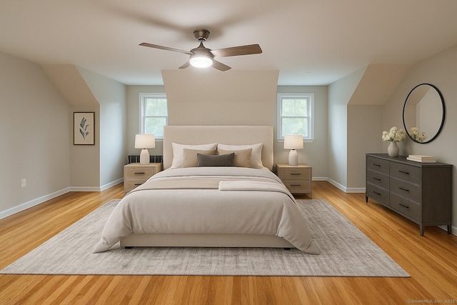 2125 Shepard Ave, Hamden, CT 06518 - bedroom with multiple windows, wood finished floors, and a ceiling fan