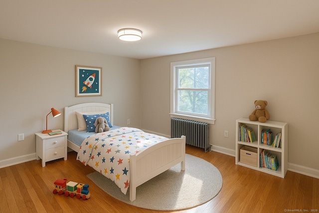 2125 Shepard Ave, Hamden, CT 06518 - bedroom with radiator heating unit and wood finished floors