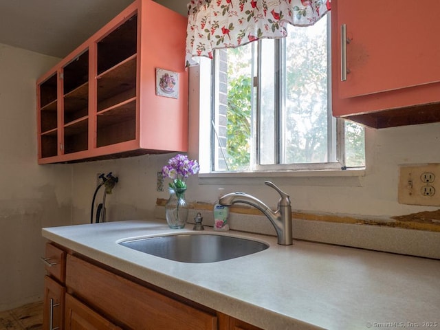 466 Middeltown Ave Unit 17, New Haven, CT 06513 - kitchen featuring light countertops and brown cabinetry