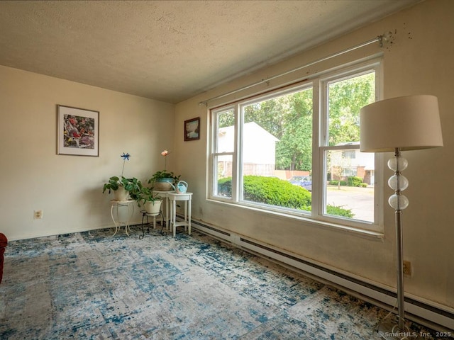 466 Middeltown Ave Unit 17, New Haven, CT 06513 - office area featuring a textured ceiling and a baseboard radiator