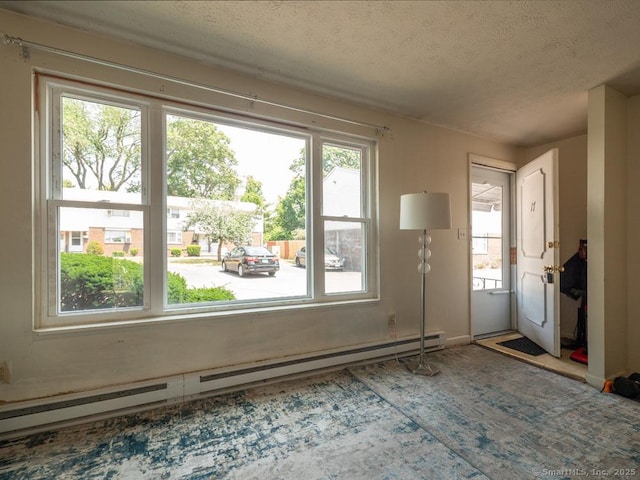466 Middeltown Ave Unit 17, New Haven, CT 06513 - interior space with a baseboard heating unit and a textured ceiling