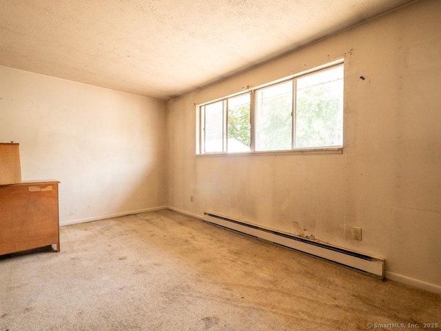 466 Middeltown Ave Unit 17, New Haven, CT 06513 - unfurnished room with baseboard heating, carpet floors, and a textured ceiling
