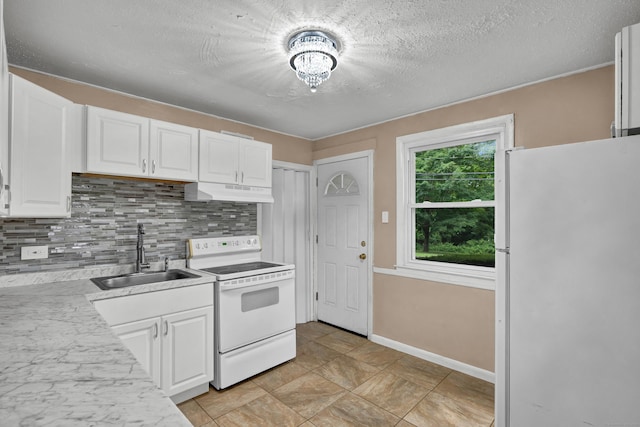 83 Woodlawn Cir E, Hartford, CT 06108 - kitchen featuring white appliances, under cabinet range hood, tasteful backsplash, white cabinetry, and light countertops