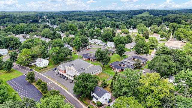 83 Woodlawn Cir E, Hartford, CT 06108 - aerial perspective of suburban area featuring a heavily wooded area
