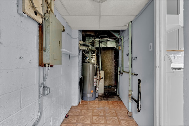 83 Woodlawn Cir E, Hartford, CT 06108 - hallway featuring water heater, electric panel, and concrete block wall