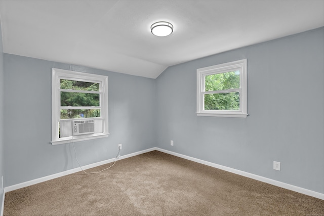 83 Woodlawn Cir E, Hartford, CT 06108 - carpeted empty room featuring lofted ceiling and cooling unit