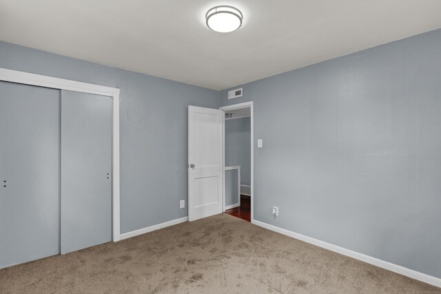 83 Woodlawn Cir E, Hartford, CT 06108 - unfurnished bedroom featuring carpet floors and a closet