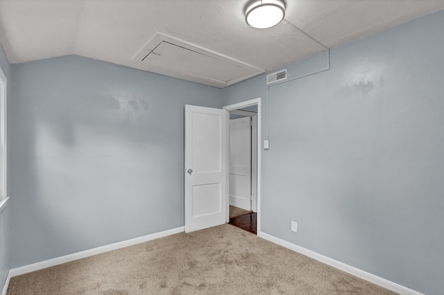 83 Woodlawn Cir E, Hartford, CT 06108 - empty room with attic access, carpet, and lofted ceiling