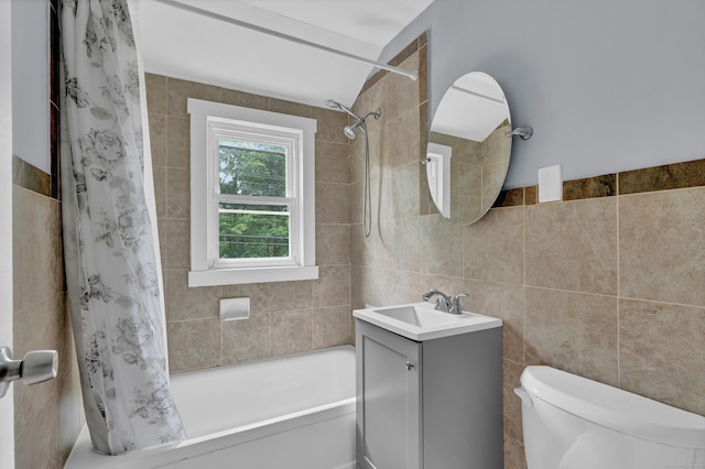 83 Woodlawn Cir E, Hartford, CT 06108 - bathroom featuring tile walls, shower / tub combo, and vanity