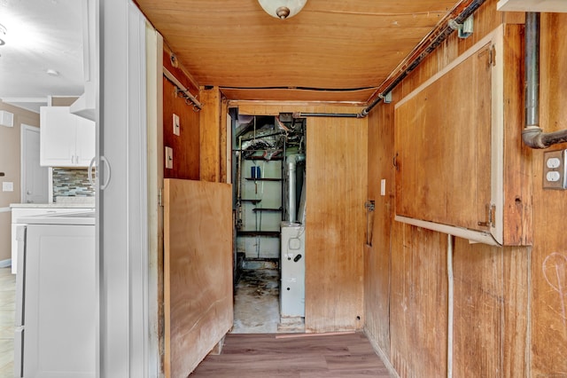 83 Woodlawn Cir E, Hartford, CT 06108 - hall with light wood finished floors and washer / dryer