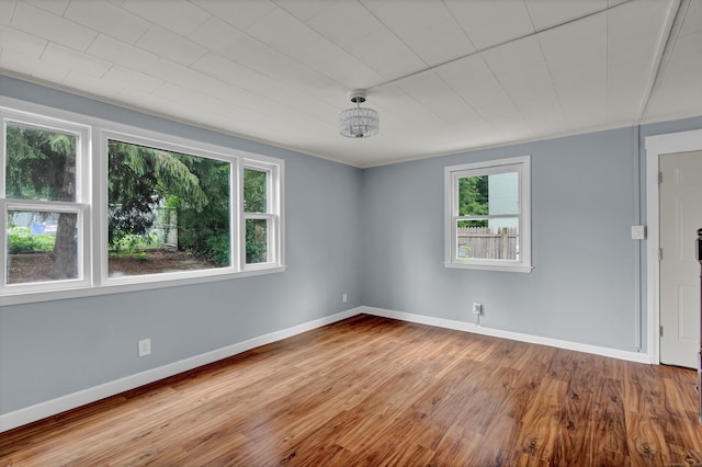 83 Woodlawn Cir E, Hartford, CT 06108 - unfurnished room with plenty of natural light and wood finished floors