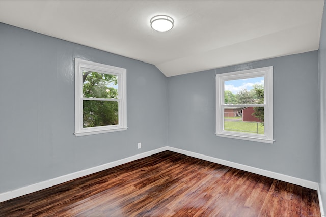 83 Woodlawn Cir E, Hartford, CT 06108 - empty room with plenty of natural light, lofted ceiling, and dark wood finished floors