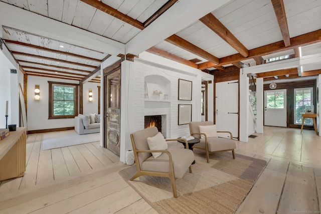 2024 Stratfield Rd, Fairfield, CT 06825 - interior space with wood-type flooring, beamed ceiling, and a brick fireplace