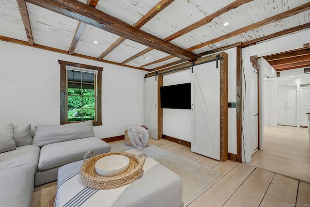2024 Stratfield Rd, Fairfield, CT 06825 - living area with a barn door, light wood-style floors, beam ceiling, and recessed lighting