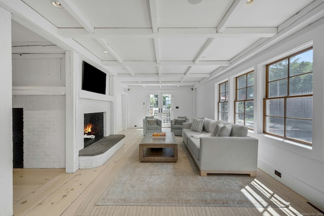 2024 Stratfield Rd, Fairfield, CT 06825 - living area with coffered ceiling, a fireplace, beamed ceiling, and hardwood / wood-style floors