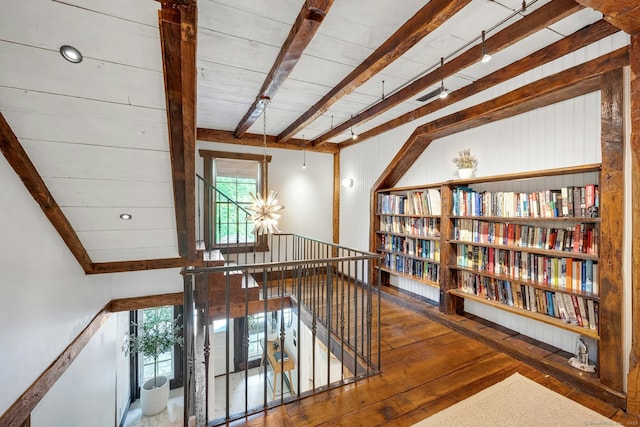2024 Stratfield Rd, Fairfield, CT 06825 - hall featuring beamed ceiling, hardwood / wood-style floors, an upstairs landing, and healthy amount of natural light
