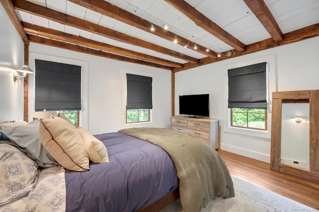 2024 Stratfield Rd, Fairfield, CT 06825 - bedroom featuring hardwood / wood-style floors and beamed ceiling