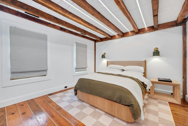 2024 Stratfield Rd, Fairfield, CT 06825 - bedroom featuring beamed ceiling and light wood finished floors