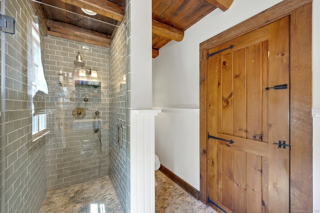 2024 Stratfield Rd, Fairfield, CT 06825 - full bath with a stall shower, a wooden ceiling with exposed beams, and a wainscoted wall