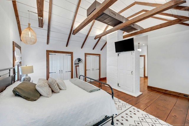 2024 Stratfield Rd, Fairfield, CT 06825 - bedroom featuring wood-type flooring, beam ceiling, two closets, and high vaulted ceiling
